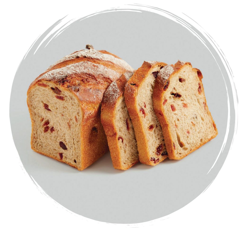 une vitrine remplie de toutes sortes de desserts différents